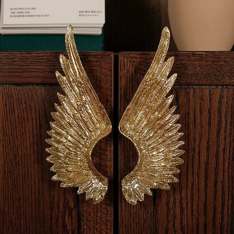 A pair of Large Gold Brass Angel Wing Cabinet Pulls/Feathery wing Door Handles/wardrobe handles/large drawer handle/big statement handles