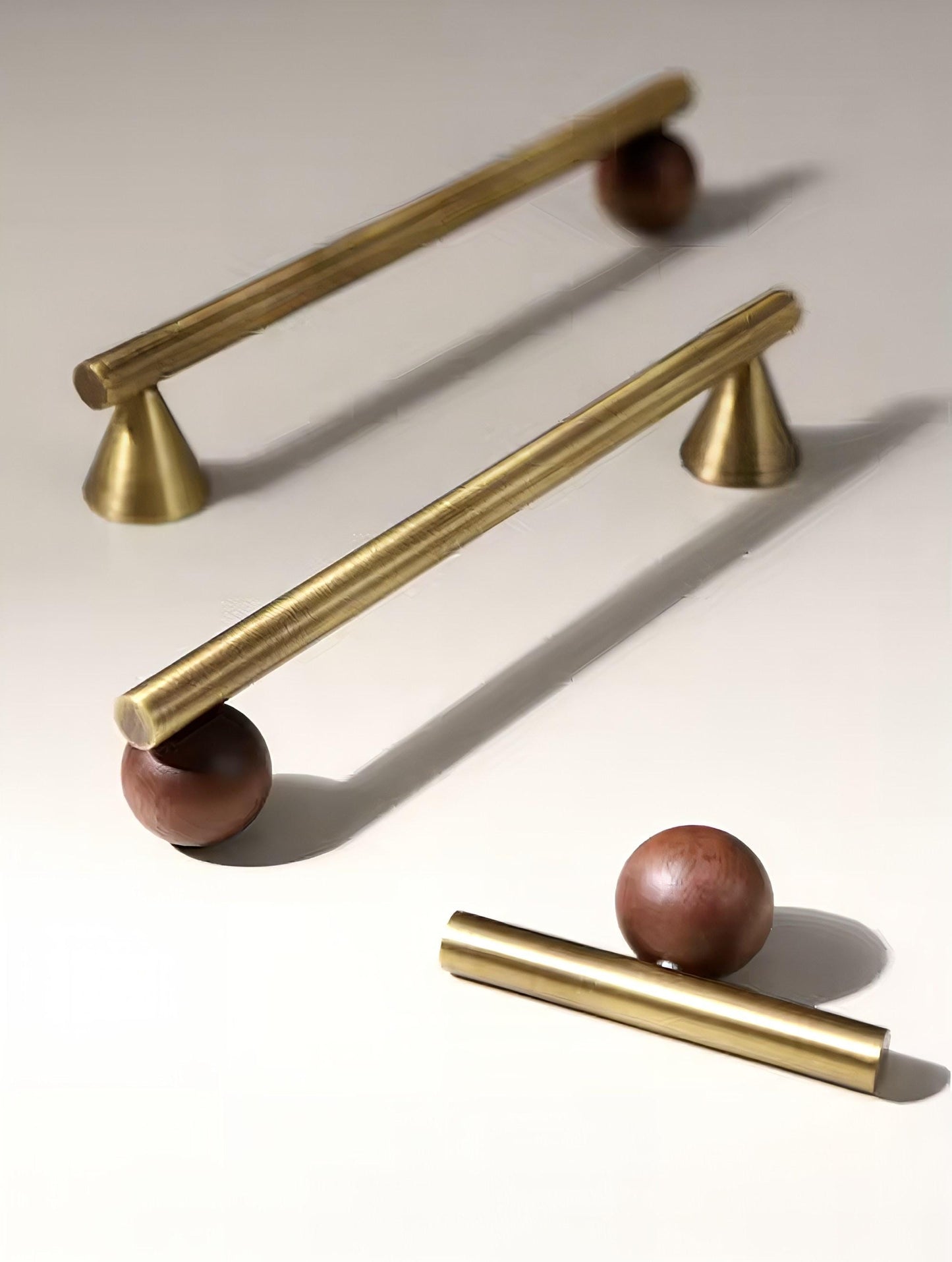 Bronze brass bar handle resting on walnut wood ball/Bronze and wood cabinet handle/Wooden furniture hardware/Bronze brass drawer pull
